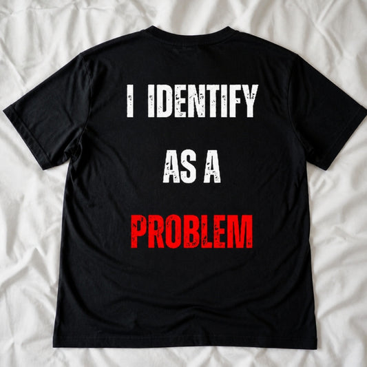 I Identify as a Problem T-Shirt flat lay, black