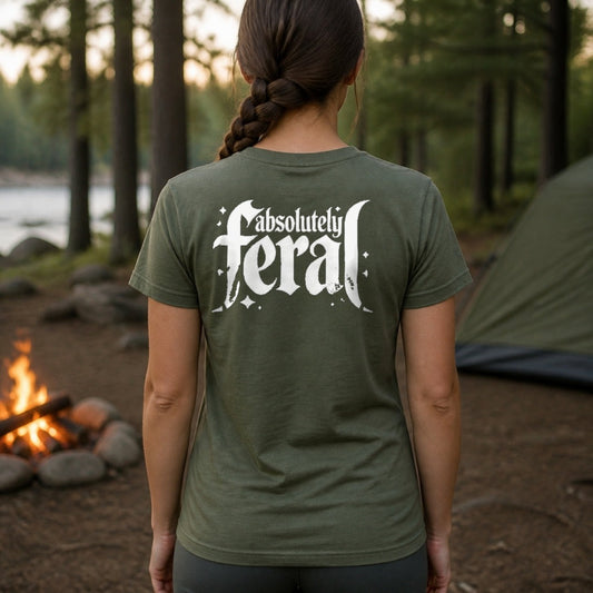 Absolutely Feral T-Shirt worn by a woman, army green