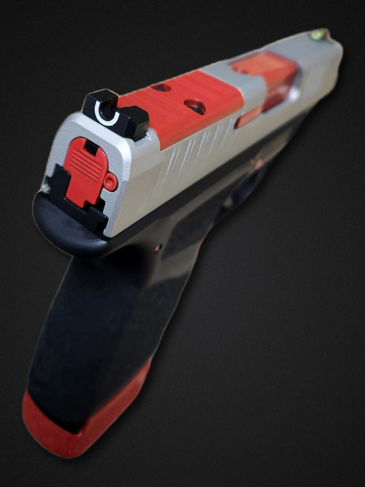 Custom Cerakote pistol - silver and red slide, rear view