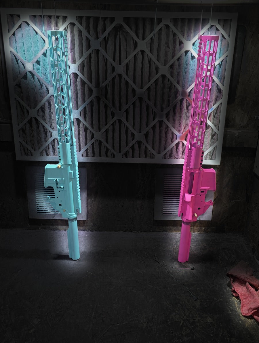 Cerakote in progress - teal and pink uppers curing in the booth