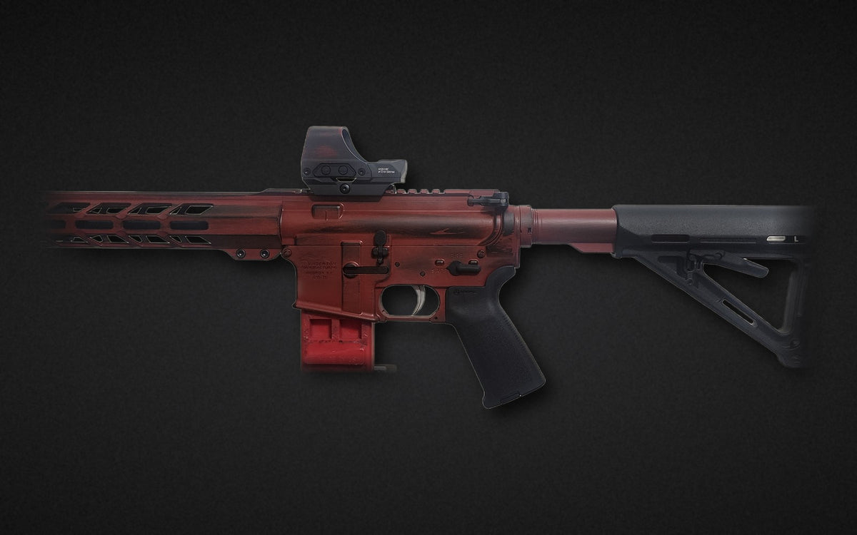 Custom Cerakote AR-15 - distressed red and black finish