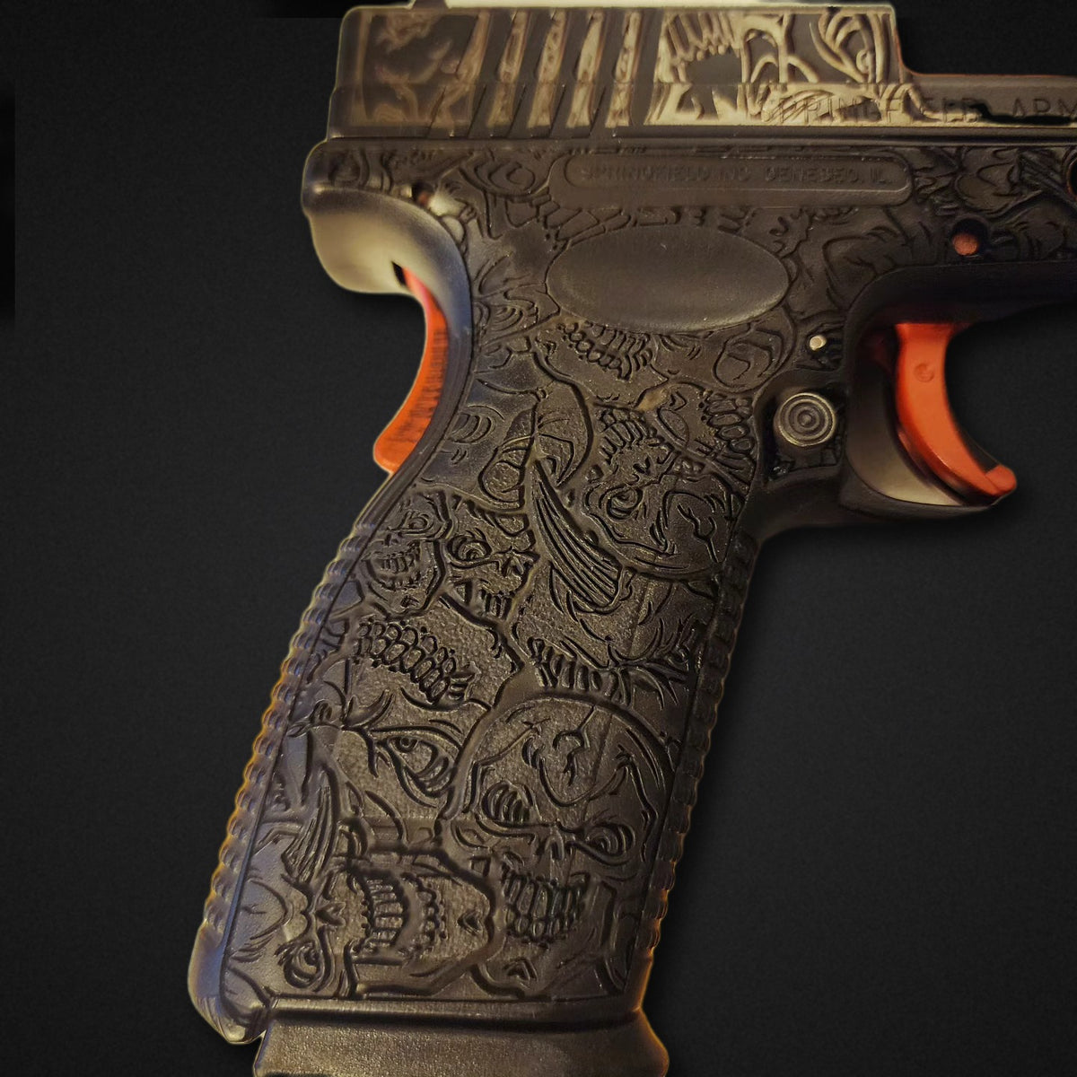 Laser engraved pistol frame - skull artwork