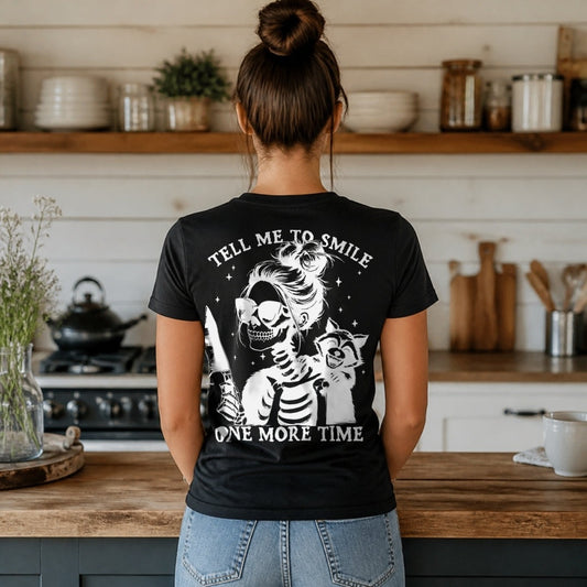 Tell Me To Smile One More Time T-Shirt worn by a woman, black